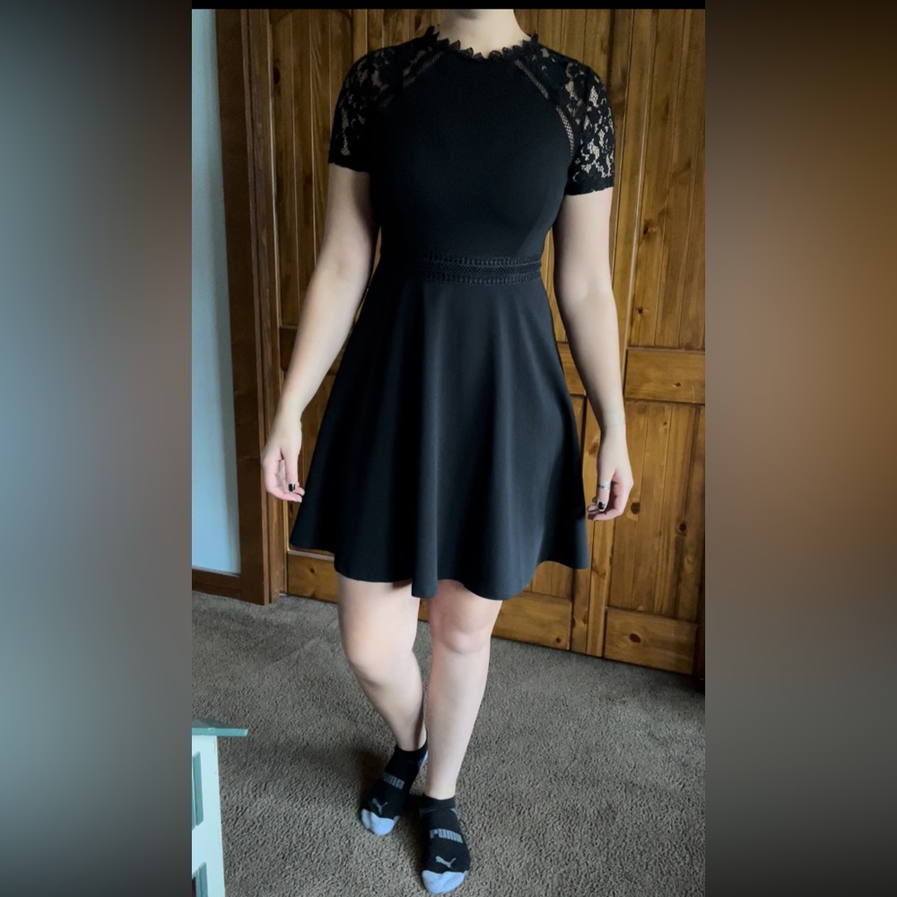 Black dress, knee length, barely used (on 6’3 model)